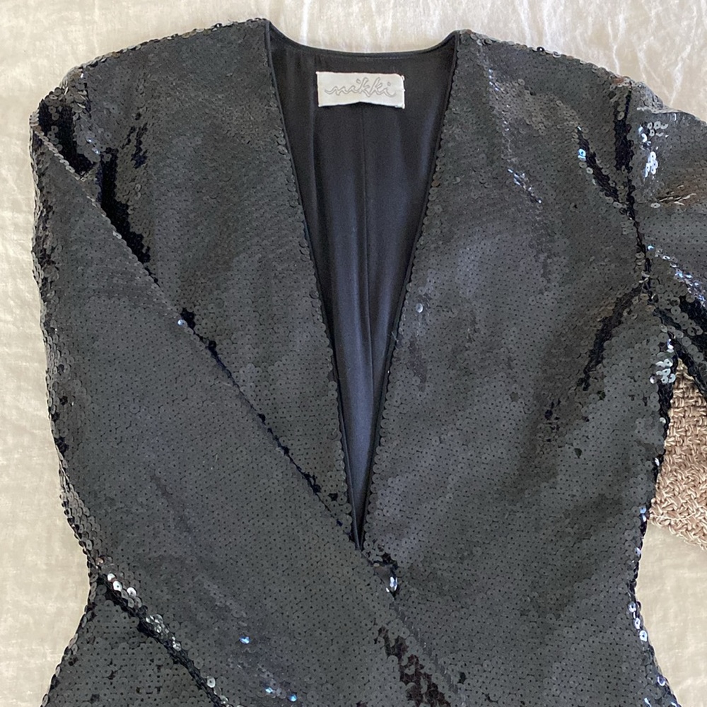 Designer two piece showstopper. Black sequin bodycon mini w jacket Fits size 6-8